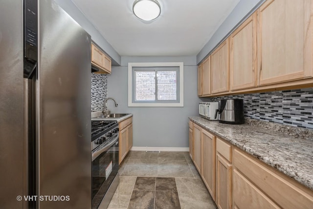 1147 E 91st St, Chicago, IL 60638 - kitchen featuring stainless steel appliances, light brown cabinets, backsplash, and light stone countertops