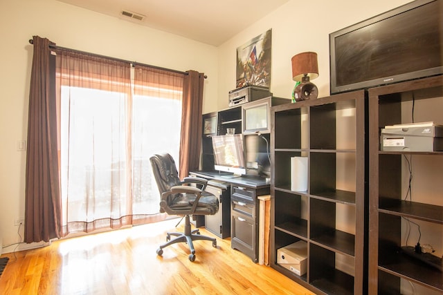 633 E Bowen Ave Unit 1E, Chicago, IL 60653 - office featuring plenty of natural light and light wood-type flooring