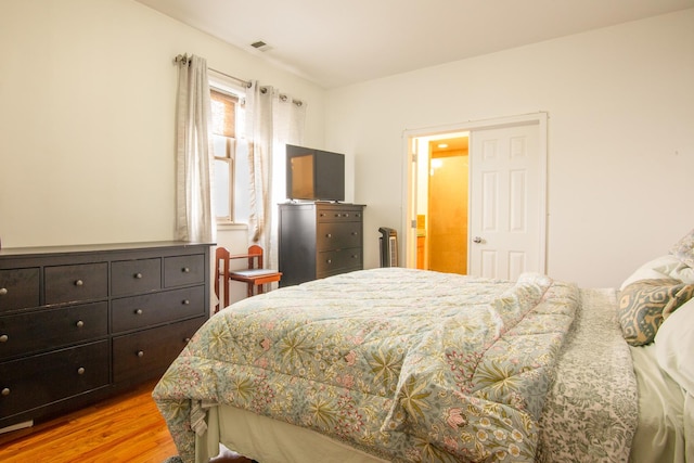 633 E Bowen Ave Unit 1E, Chicago, IL 60653 - bedroom featuring light wood-type flooring