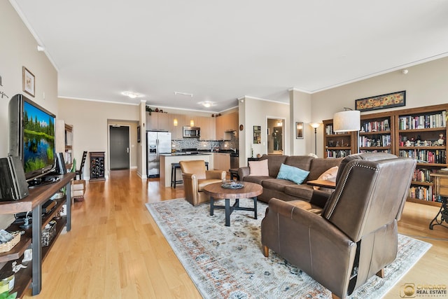 225 N Columbus Dr Unit 6808, Chicago, IL 60601 - living area featuring crown molding and light wood-style floors