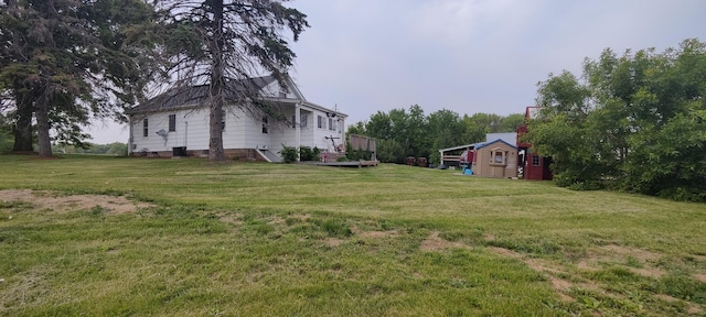 3232 Prairie Rd, Rockford, IL 61102 - view of green lawn with a storage unit