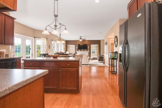 414 Alden Dr, Sycamore, IL 60178 - kitchen with black refrigerator with ice dispenser, dishwasher, ceiling fan, and light wood-type flooring