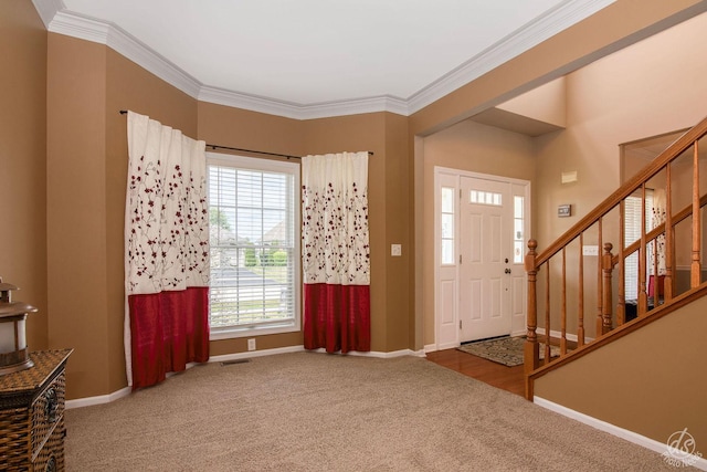414 Alden Dr, Sycamore, IL 60178 - entrance foyer featuring carpet, stairway, and ornamental molding