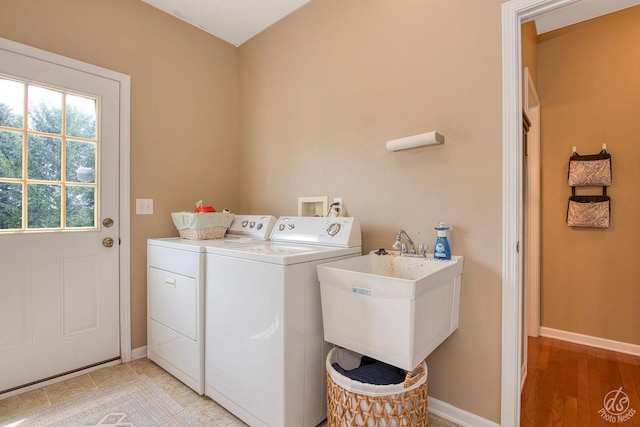 414 Alden Dr, Sycamore, IL 60178 - laundry room featuring washing machine and clothes dryer and baseboards