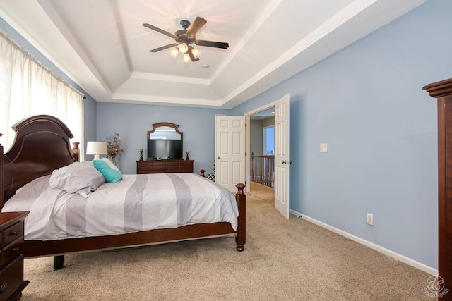 414 Alden Dr, Sycamore, IL 60178 - bedroom with a raised ceiling, light colored carpet, and a ceiling fan