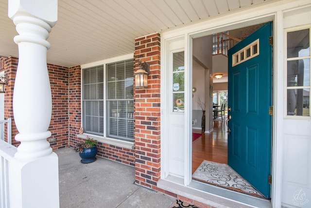 414 Alden Dr, Sycamore, IL 60178 - entrance to property featuring covered porch and brick siding