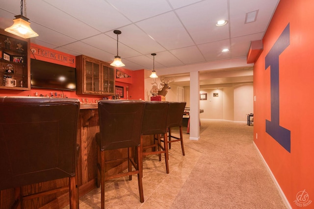 414 Alden Dr, Sycamore, IL 60178 - indoor wet bar featuring pendant lighting, recessed lighting, a paneled ceiling, and light carpet