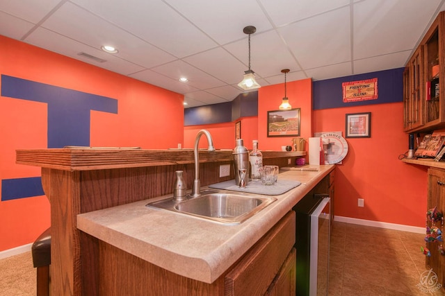 414 Alden Dr, Sycamore, IL 60178 - indoor wet bar featuring a drop ceiling, decorative light fixtures, recessed lighting, and dark tile patterned flooring