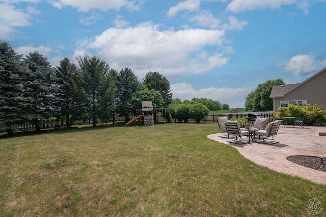 414 Alden Dr, Sycamore, IL 60178 - fenced backyard with a playground and a patio area