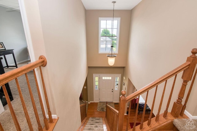 414 Alden Dr, Sycamore, IL 60178 - foyer with wood finished floors, a towering ceiling, and stairs