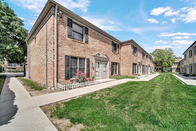 1746 Sessions Walk Unit 1746, Hoffman Estates, IL 60169 - townhome / multi-family property featuring a front yard and brick siding