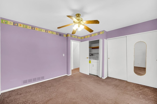 1746 Sessions Walk Unit 1746, Hoffman Estates, IL 60169 - unfurnished bedroom featuring carpet flooring, washer and clothes dryer, ceiling fan, and two closets