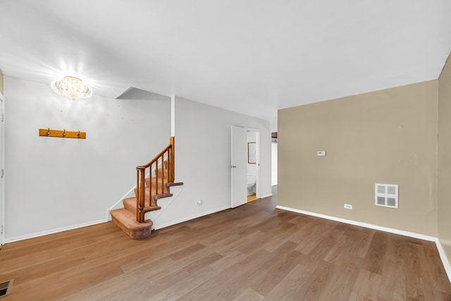 1746 Sessions Walk Unit 1746, Hoffman Estates, IL 60169 - unfurnished room with wood finished floors and stairway