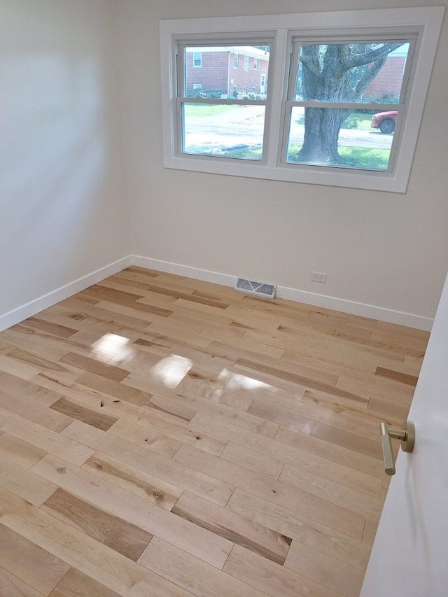 5841 Sunrise Ave, Clarendon Hills, IL 60514 - empty room featuring light wood-type flooring and baseboards