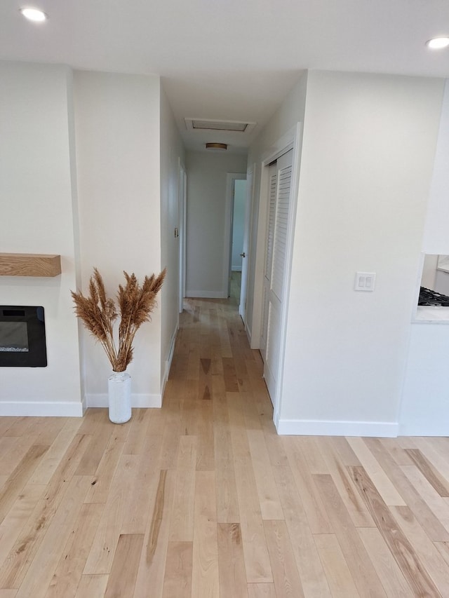 5841 Sunrise Ave, Clarendon Hills, IL 60514 - hallway featuring light wood-type flooring and recessed lighting