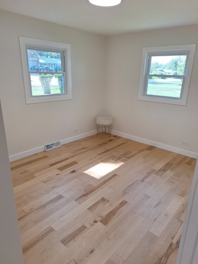 5841 Sunrise Ave, Clarendon Hills, IL 60514 - unfurnished room with light wood-style floors