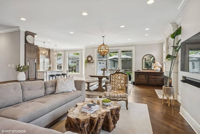 725 Park Plaine Ave, Park Ridge, IL 60068 - living area with dark wood-style flooring, recessed lighting, a chandelier, and ornamental molding
