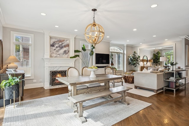 725 Park Plaine Ave, Park Ridge, IL 60068 - dining room with a premium fireplace, plenty of natural light, wood finished floors, recessed lighting, and ornamental molding