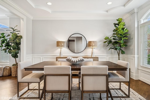 725 Park Plaine Ave, Park Ridge, IL 60068 - dining room with wood finished floors, a raised ceiling, a decorative wall, wainscoting, and crown molding