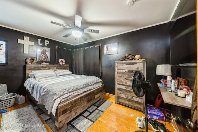5813 Superior St, Berkeley, IL 60163 - bedroom featuring wood finished floors, crown molding, and a ceiling fan