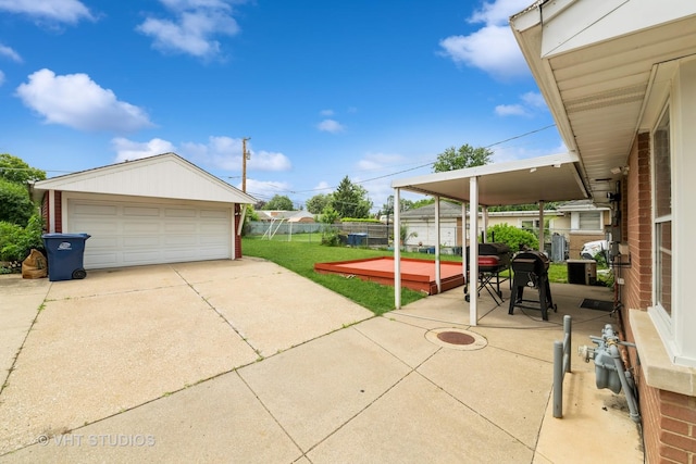 5813 Superior St, Berkeley, IL 60163 - fenced backyard with a garage and an outbuilding