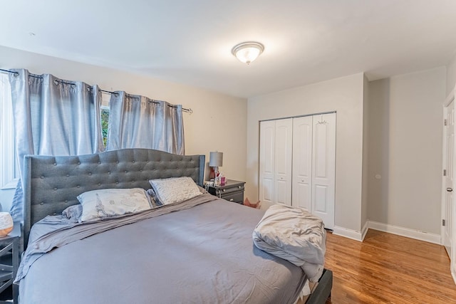 189 Westwood Dr, Park Forest, IL 60466 - bedroom featuring a closet and wood finished floors