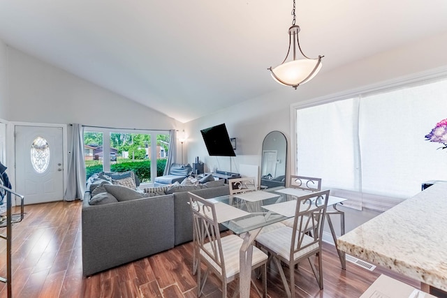 189 Westwood Dr, Park Forest, IL 60466 - dining space featuring high vaulted ceiling and dark wood-type flooring