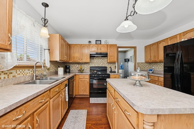 2930 Plumrose Ln, Mchenry, IL 60050 - kitchen with black appliances, light countertops, backsplash, and exhaust hood
