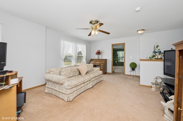 2930 Plumrose Ln, Mchenry, IL 60050 - carpeted living room with a ceiling fan and baseboards