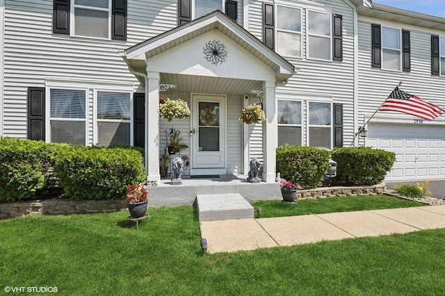 2930 Plumrose Ln, Mchenry, IL 60050 - view of exterior entry featuring a garage and a lawn