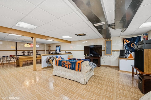 2930 Plumrose Ln, Mchenry, IL 60050 - living room featuring a paneled ceiling and electric panel