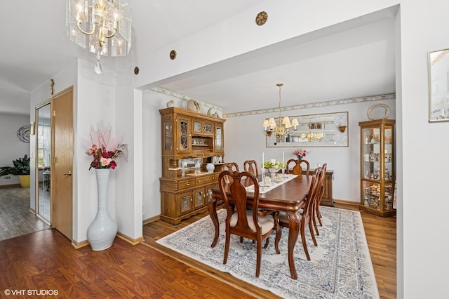 2930 Plumrose Ln, Mchenry, IL 60050 - dining area featuring a chandelier and wood finished floors