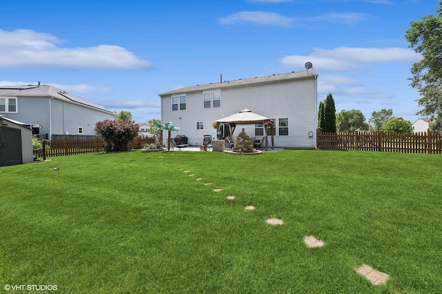 2930 Plumrose Ln, Mchenry, IL 60050 - back of house featuring a gazebo, a fenced backyard, a patio area, and a shed