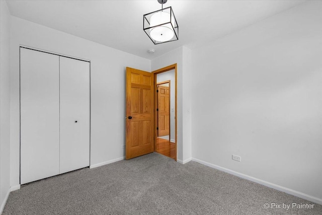 1422 Ridgeway St, Round Lake Beach, IL 60073 - unfurnished bedroom featuring carpet and a closet