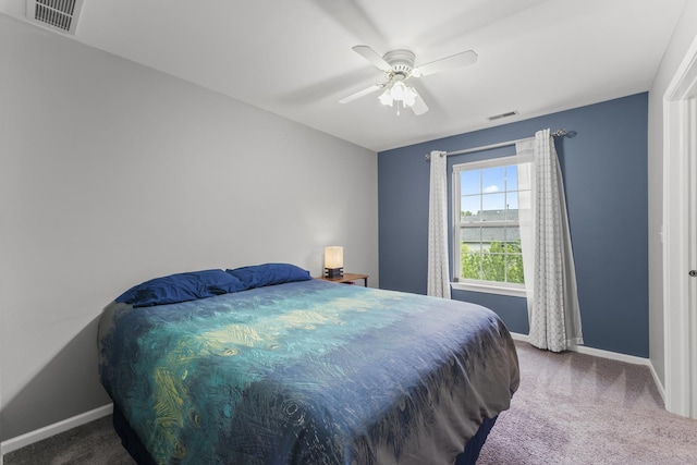 59 Colonial Ct, Streamwood, IL 60107 - carpeted bedroom with baseboards and a ceiling fan