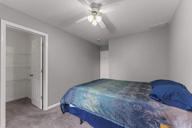 59 Colonial Ct, Streamwood, IL 60107 - bedroom with carpet floors, a ceiling fan, a walk in closet, and a closet