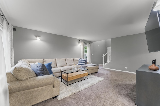59 Colonial Ct, Streamwood, IL 60107 - carpeted living area with stairs and baseboards