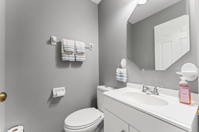 59 Colonial Ct, Streamwood, IL 60107 - half bath featuring toilet and vanity