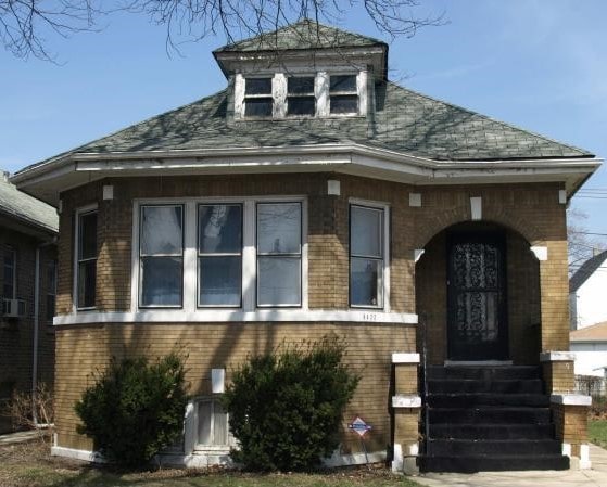 4422 W Iowa St, Chicago, IL 60651 - view of front of house with brick siding and roof with shingles