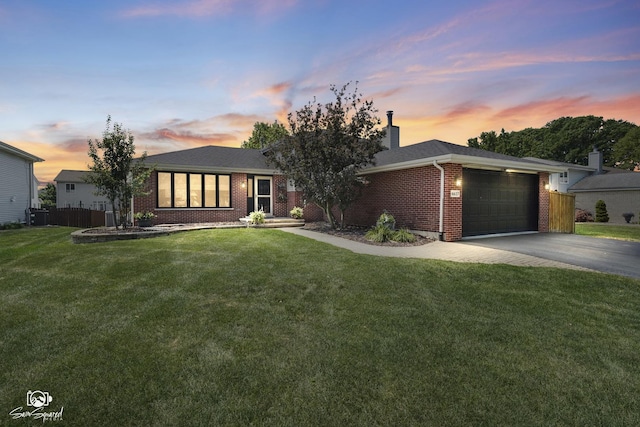 16637 W Oneida Dr, Lockport, IL 60441 - single story home with brick siding, concrete driveway, an attached garage, and a chimney