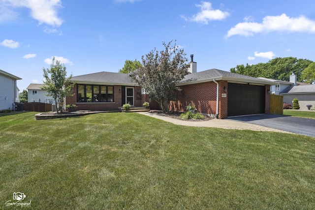 16637 W Oneida Dr, Lockport, IL 60441 - ranch-style house featuring brick siding, asphalt driveway, a chimney, and a garage