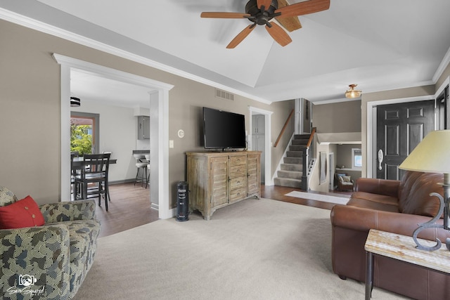 16637 W Oneida Dr, Lockport, IL 60441 - living room featuring a ceiling fan, stairway, ornamental molding, and lofted ceiling