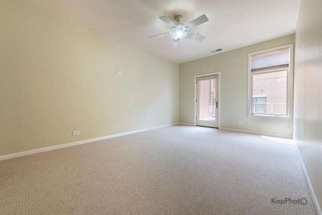 915 S Oak Park Ave Unit 1B, Oak Park, IL 60304 - spare room featuring light colored carpet and a ceiling fan