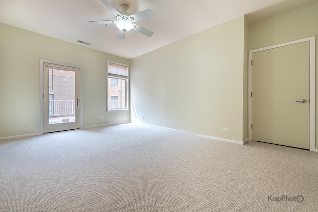 915 S Oak Park Ave Unit 1B, Oak Park, IL 60304 - empty room with light colored carpet and a ceiling fan