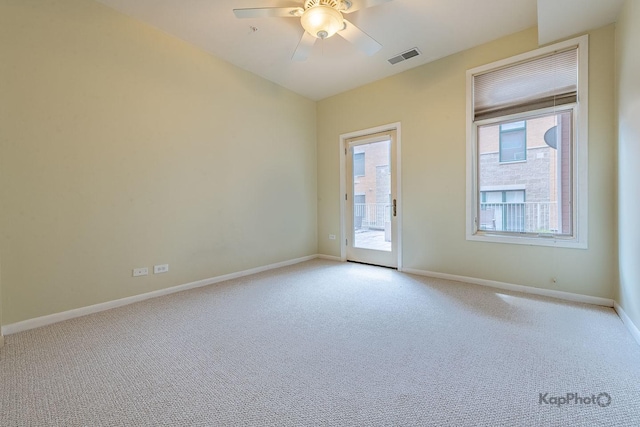 915 S Oak Park Ave Unit 1B, Oak Park, IL 60304 - unfurnished room featuring light colored carpet and ceiling fan