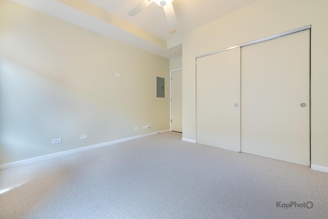 915 S Oak Park Ave Unit 1B, Oak Park, IL 60304 - unfurnished bedroom with light carpet, electric panel, a closet, and a ceiling fan