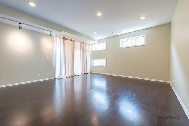 915 S Oak Park Ave Unit 1B, Oak Park, IL 60304 - empty room featuring dark wood-style flooring and recessed lighting