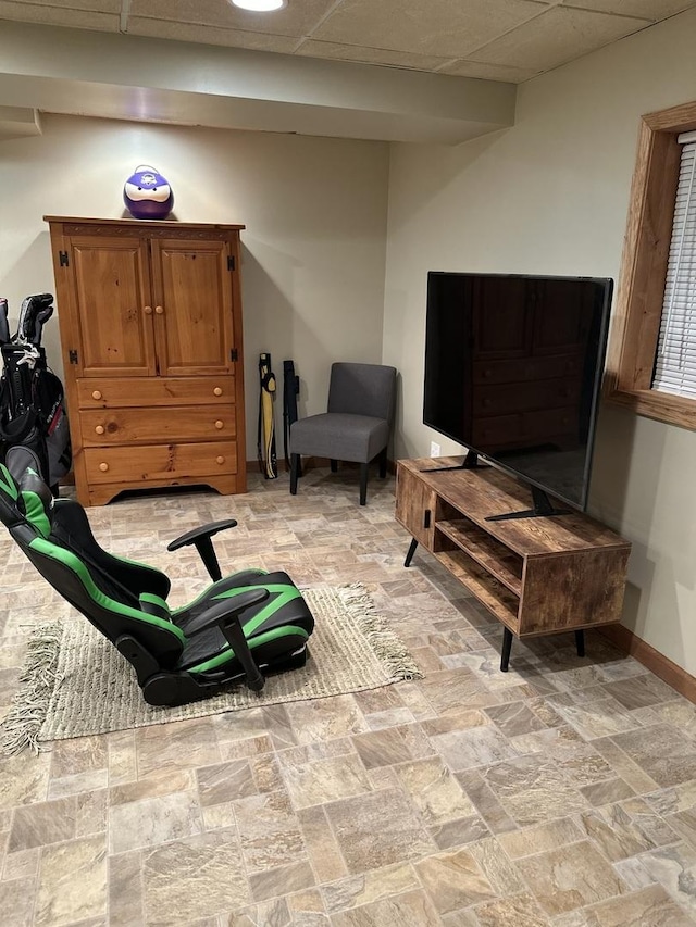 5209 Meadowbrook St, Plainfield, IL 60586 - living area with baseboards and a drop ceiling