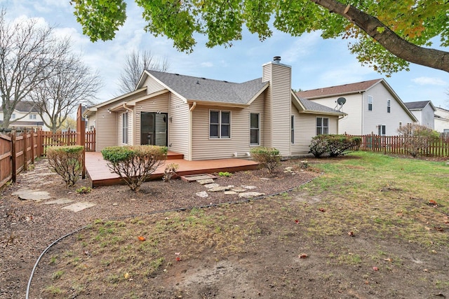 5209 Meadowbrook St, Plainfield, IL 60586 - rear view of property with a fenced backyard, a chimney, a deck, and a shingled roof