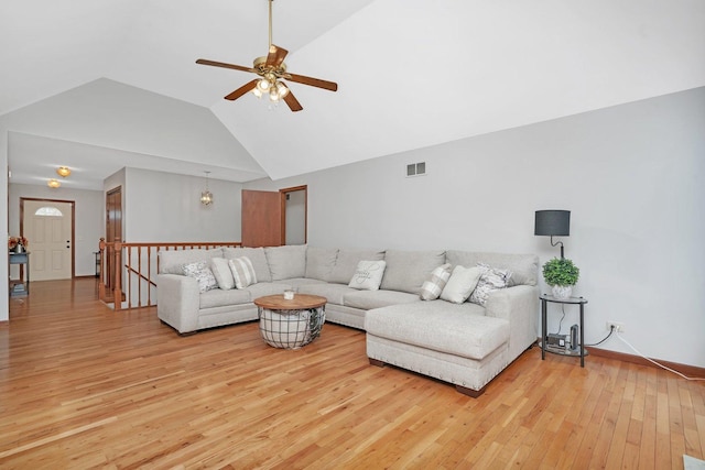 5209 Meadowbrook St, Plainfield, IL 60586 - living room with light wood-style flooring, ceiling fan, and high vaulted ceiling